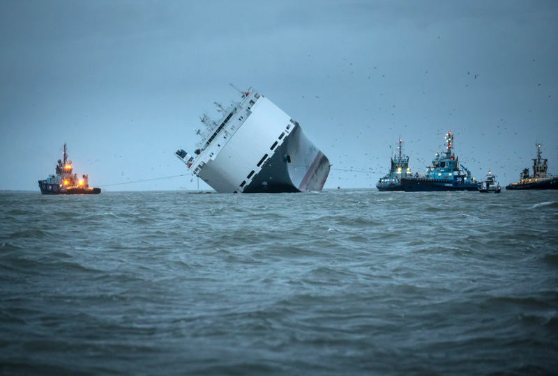 Illustration for article titled These Photos Of That Grounded Car Carrier Ship Are Beautifully Surreal